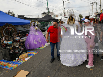 Devotees visit the Altar of Santa Muerte located on Alfareria Street in the Tepito neighborhood to show their devotion and give thanks for f...