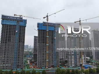 A building under construction by C&D Group is in Nanjing, Jiangsu province, China, on November 1, 2024. On November 1, 2024, a number of Chi...