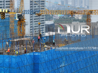 A building under construction by C&D Group is in Nanjing, Jiangsu province, China, on November 1, 2024. On November 1, 2024, a number of Chi...