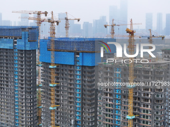 A building under construction by C&D Group is in Nanjing, Jiangsu province, China, on November 1, 2024. On November 1, 2024, a number of Chi...