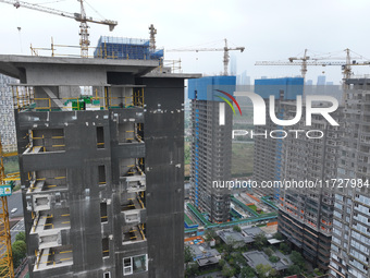 A building under construction by C&D Group is in Nanjing, Jiangsu province, China, on November 1, 2024. On November 1, 2024, a number of Chi...