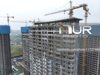 A building under construction by C&D Group is in Nanjing, Jiangsu province, China, on November 1, 2024. On November 1, 2024, a number of Chi...