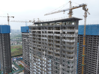 A building under construction by C&D Group is in Nanjing, Jiangsu province, China, on November 1, 2024. On November 1, 2024, a number of Chi...