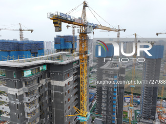 A building under construction by C&D Group is in Nanjing, Jiangsu province, China, on November 1, 2024. On November 1, 2024, a number of Chi...