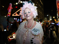 Costumed parade goers celebrate during the 51st Annual Village Halloween Parade in New York, NY, on October 31, 2024. (