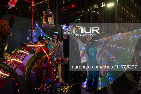 Costumed parade goers celebrate during the 51st Annual Village Halloween Parade in New York, NY, on October 31, 2024. 