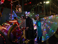 Costumed parade goers celebrate during the 51st Annual Village Halloween Parade in New York, NY, on October 31, 2024. (