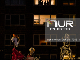 Costumed parade goers celebrate during the 51st Annual Village Halloween Parade in New York, NY, on October 31, 2024. (