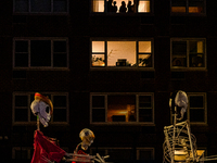 Costumed parade goers celebrate during the 51st Annual Village Halloween Parade in New York, NY, on October 31, 2024. (