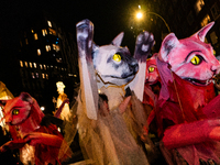 Costumed parade goers celebrate during the 51st Annual Village Halloween Parade in New York, NY, on October 31, 2024. (