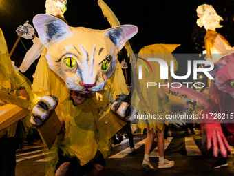 Costumed parade goers celebrate during the 51st Annual Village Halloween Parade in New York, NY, on October 31, 2024. (