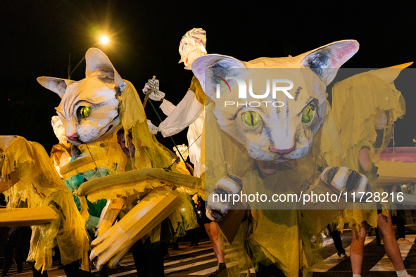 Costumed parade goers celebrate during the 51st Annual Village Halloween Parade in New York, NY, on October 31, 2024. 