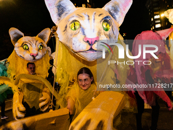 Costumed parade goers celebrate during the 51st Annual Village Halloween Parade in New York, NY, on October 31, 2024. (