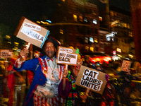 Costumed parade goers celebrate during the 51st Annual Village Halloween Parade in New York, NY, on October 31, 2024. (