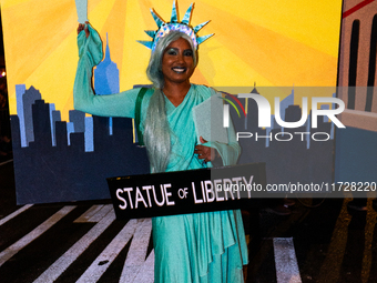 Costumed parade goers celebrate during the 51st Annual Village Halloween Parade in New York, NY, on October 31, 2024. (