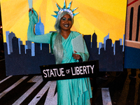 Costumed parade goers celebrate during the 51st Annual Village Halloween Parade in New York, NY, on October 31, 2024. (