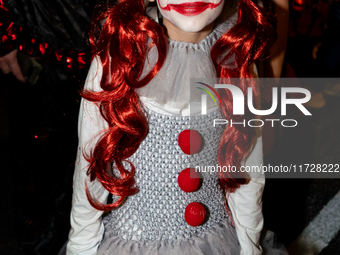 Costumed parade goers celebrate during the 51st Annual Village Halloween Parade in New York, NY, on October 31, 2024. (