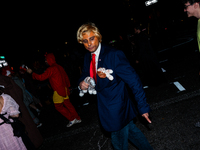 Costumed parade goers celebrate during the 51st Annual Village Halloween Parade in New York, NY, on October 31, 2024. (