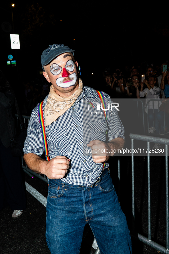 Costumed parade goers celebrate during the 51st Annual Village Halloween Parade in New York, NY, on October 31, 2024. 