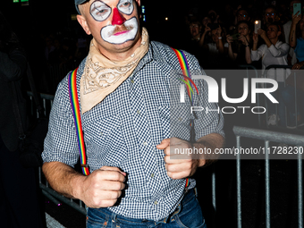 Costumed parade goers celebrate during the 51st Annual Village Halloween Parade in New York, NY, on October 31, 2024. (