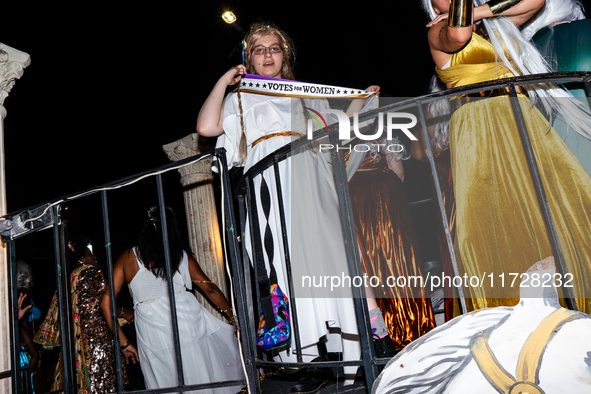 Costumed parade goers celebrate during the 51st Annual Village Halloween Parade in New York, NY, on October 31, 2024. 