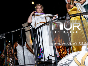 Costumed parade goers celebrate during the 51st Annual Village Halloween Parade in New York, NY, on October 31, 2024. (