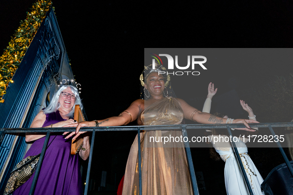 Costumed parade goers celebrate during the 51st Annual Village Halloween Parade in New York, NY, on October 31, 2024. 