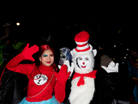 Costumed parade goers pose for a photo during the 51st Annual Village Halloween Parade in New York, NY, on October 31, 2024. (