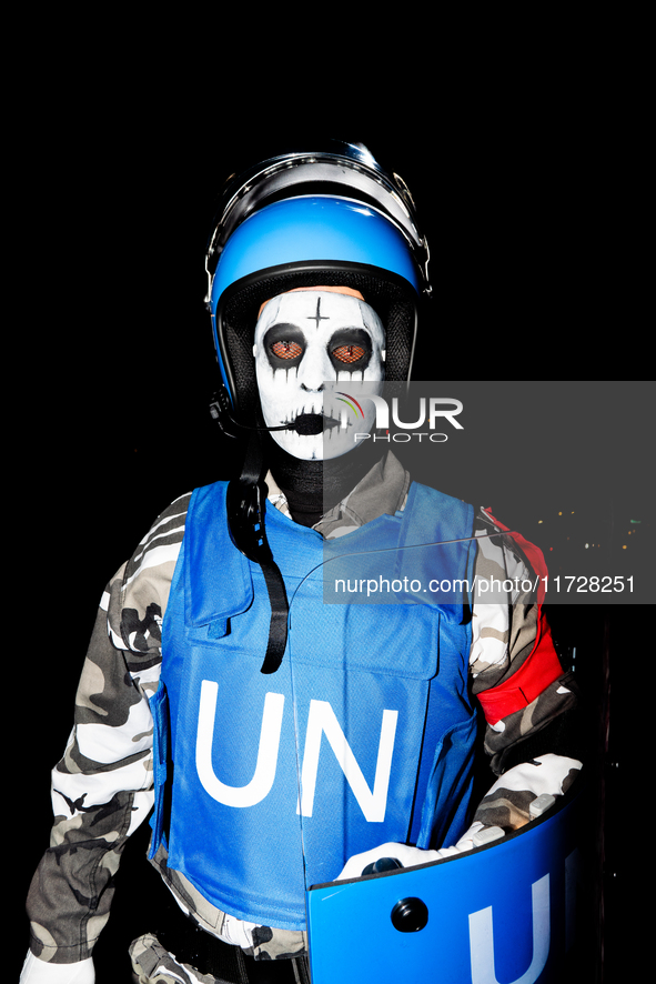 Costumed parade goers march during the 51st Annual Village Halloween Parade in New York, NY, on October 31, 2024. 