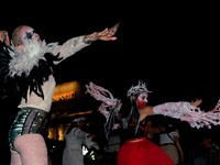 Costumed parade goers dance during the 51st Annual Village Halloween Parade in New York, NY, on October 31, 2024. (