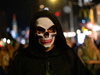 Costumed parade goers celebrate during the 51st Annual Village Halloween Parade in New York, NY, on October 31, 2024. (