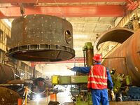 A construction worker builds petrochemical equipment parts at Lanshi Heavy Machinery Co., LTD., Hongshiya Street, in Qingdao, China, on Octo...