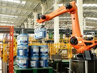 A worker produces lubricating oil on a production line at Qingdao Compton Technology Co LTD in Hongshiya Street, Qingdao, China, on October...