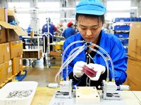 Workers increase product production at Qingdao Shanhai Household Products Co., LTD., Hongshiya Street, in Qingdao, China, on October 31, 202...