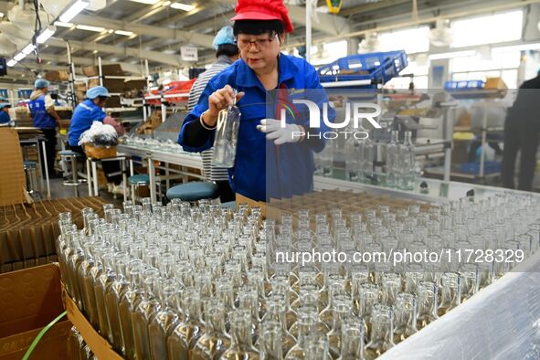 Workers increase product production at Qingdao Shanhai Household Products Co., LTD., Hongshiya Street, in Qingdao, China, on October 31, 202...