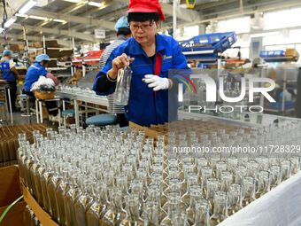 Workers increase product production at Qingdao Shanhai Household Products Co., LTD., Hongshiya Street, in Qingdao, China, on October 31, 202...