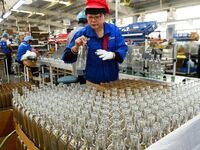 Workers increase product production at Qingdao Shanhai Household Products Co., LTD., Hongshiya Street, in Qingdao, China, on October 31, 202...