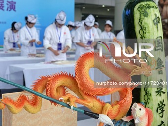 Students from Yantai Vocational College of Culture and Tourism perform during a cooking show at the 2024 Yantai International Food Industry...