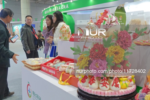 Visitors visit the 2024 Yantai International Food Industry Expo in Yantai, China, on November 1, 2024. 