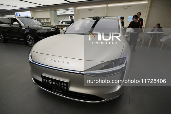 The HarmonyOS electric car is on display at the Huawei store at Deji Square in Nanjing, Jiangsu province, China, on November 1, 2024. 