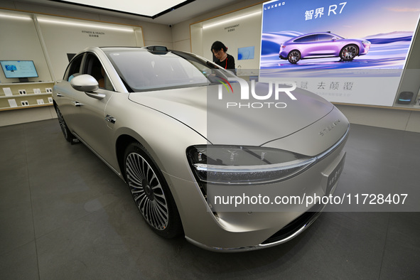 The HarmonyOS electric car is on display at the Huawei store at Deji Square in Nanjing, Jiangsu province, China, on November 1, 2024. 