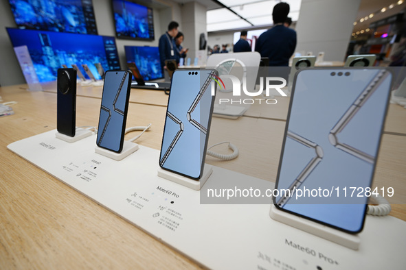 Mobile phones are on display at the Huawei store at Deji Square in Nanjing, China, on November 1, 2024. 