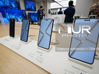 Mobile phones are on display at the Huawei store at Deji Square in Nanjing, China, on November 1, 2024. (