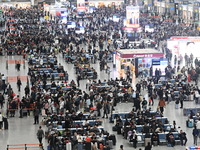 The waiting hall of Hongqiao Railway Station in Shanghai, China, on November 1, 2024, is crowded with passengers. Affected by Typhoon Kong-R...