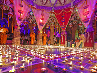 Priests perform 'aarti' at the Akshardham temple during the 'Deepotsav' celebration on the occasion of the 'Diwali' festival in Jaipur, Raja...