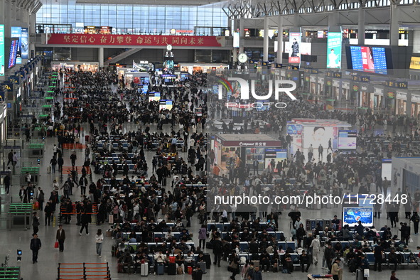 The waiting hall of Hongqiao Railway Station in Shanghai, China, on November 1, 2024, is crowded with passengers. Affected by Typhoon Kong-R...