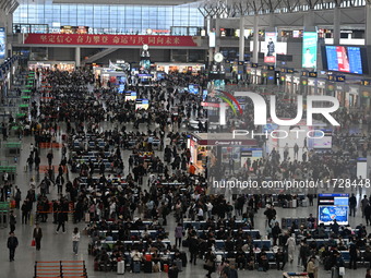 The waiting hall of Hongqiao Railway Station in Shanghai, China, on November 1, 2024, is crowded with passengers. Affected by Typhoon Kong-R...