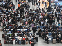 The waiting hall of Hongqiao Railway Station in Shanghai, China, on November 1, 2024, is crowded with passengers. Affected by Typhoon Kong-R...