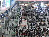 The waiting hall of Hongqiao Railway Station in Shanghai, China, on November 1, 2024, is crowded with passengers. Affected by Typhoon Kong-R...