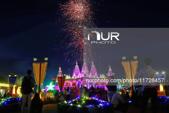 Fireworks light the sky at the illuminated Akshardham temple on the occasion of the 'Diwali' festival in Jaipur, Rajasthan, India, on Octobe...